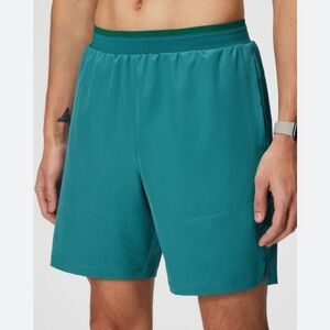 Fabletics green and blue lined athletic shorts